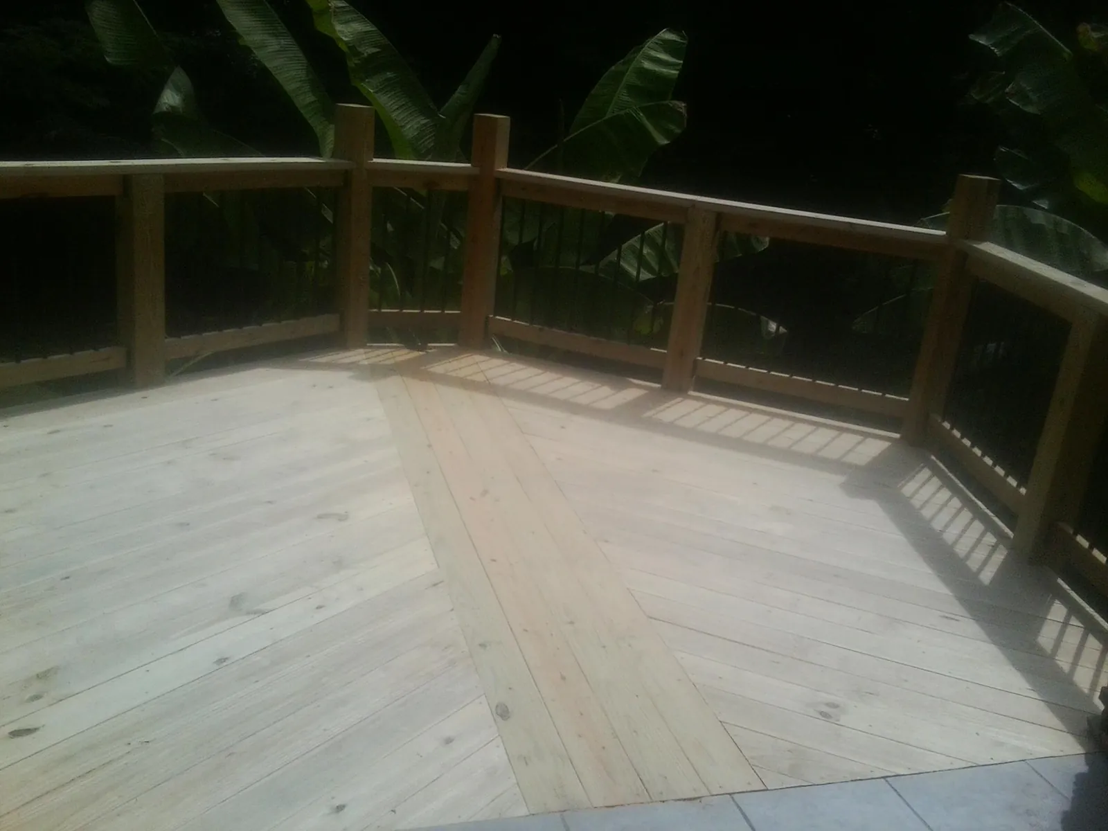 New wood deck and railing built off the back of a home in Federalsburg