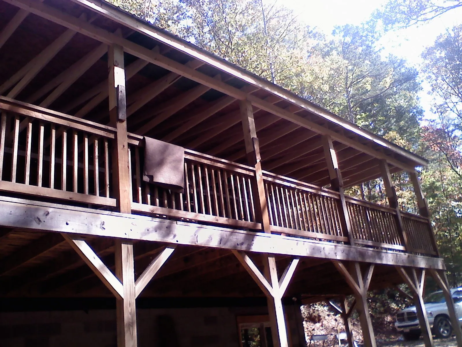 Timber framing under a new elevated porch and deck — Roof Leak Repair in Federalsburg by Roofing Brothers